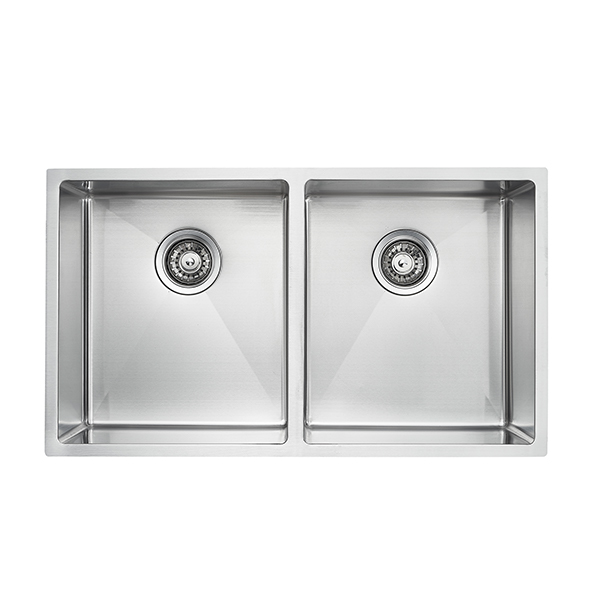 Stainless steel kitchen sink installed in a modern countertop